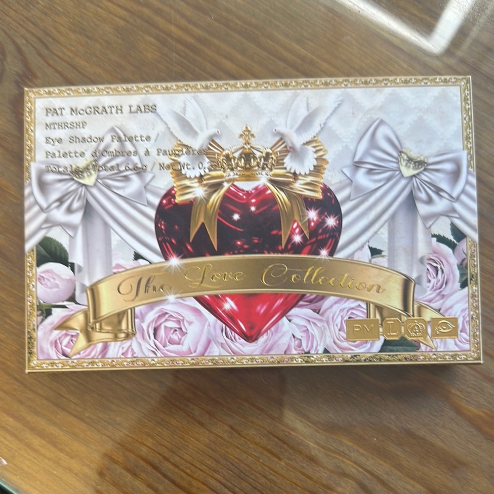 Pat McGrath Labs Eye Shadow Palette with Red and Gold Design
